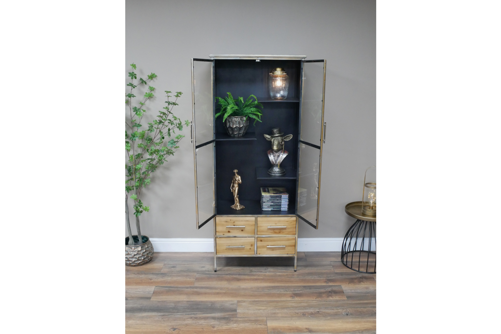 Muted gold slim tall glass fronted metal display cabinet.