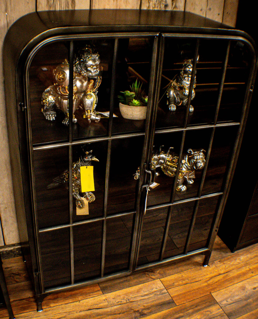 Glass fronted metal storage floor display cabinet.