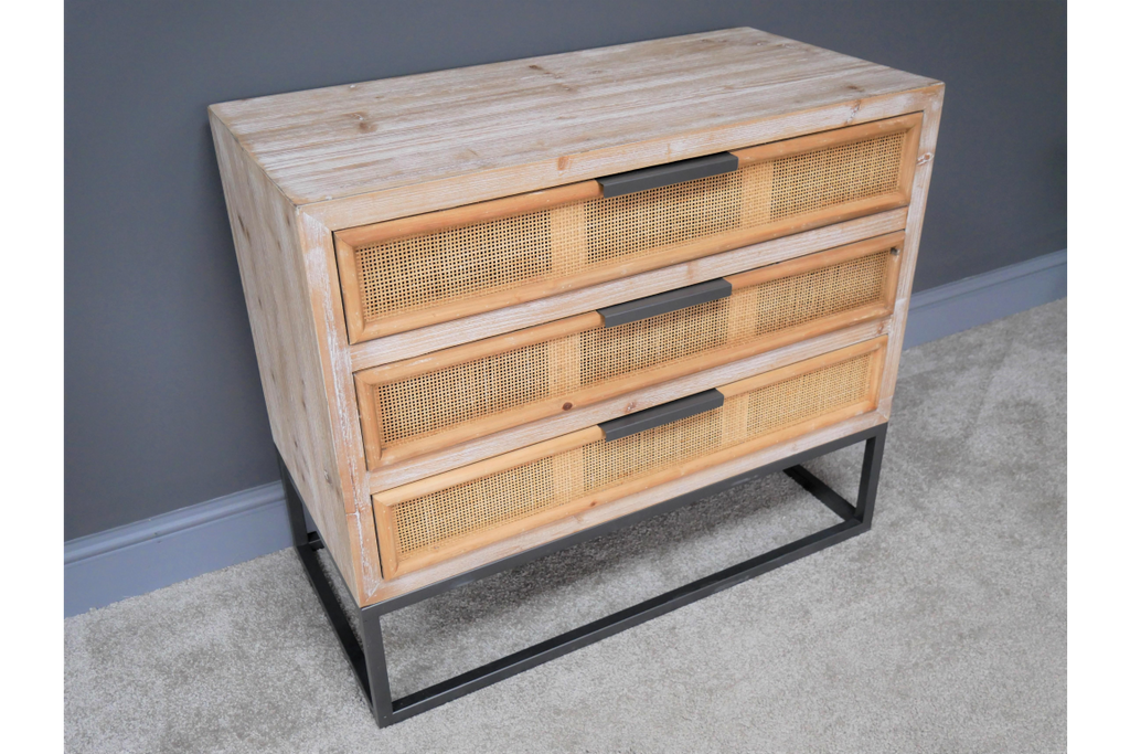 Boho natural wood & rattan chest of drawers.
