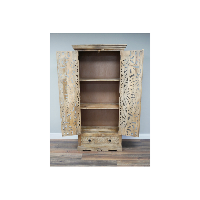 Tall ornate carved natural wood shelved cupboard