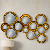 Set of 12 assorted convex gold framed decorative wall mirrors