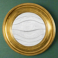 Large round antiqued gold convex mirror