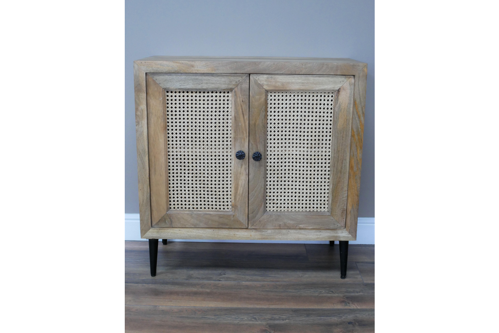 Petite wood & iron side cabinet with rattan fretwork doors.