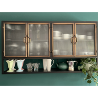 Black metal wide wall storage cabinet with ribbed glass double doors