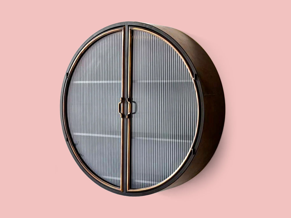 Round black metal large wall cabinet with ribbed glass double doors.