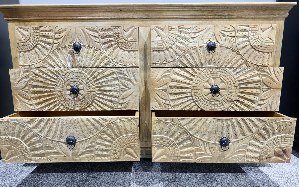 Large ornate carved natural wood chest of drawers
