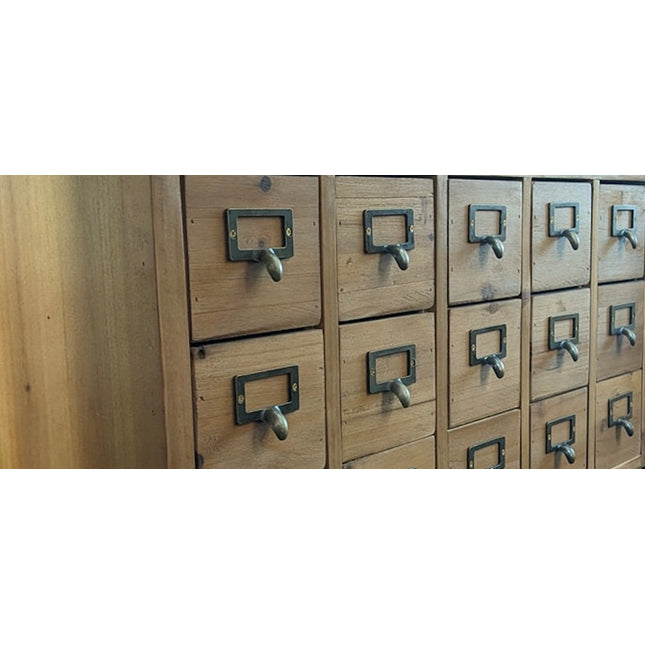 Wood multi drawer apothecary storage cabinet.