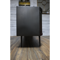 Large curvy ribbed metal storage cabinet