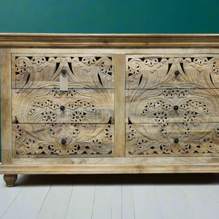Large ornate carved natural wood chest of 6 drawers