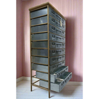 Tall slim bank of 10 metal storage drawers