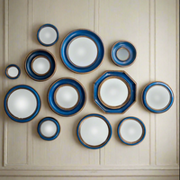 Set of 12 convex blue & gold framed wall mirrors