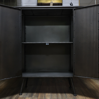 Curvy ribbed metal industrial retro storage cabinet