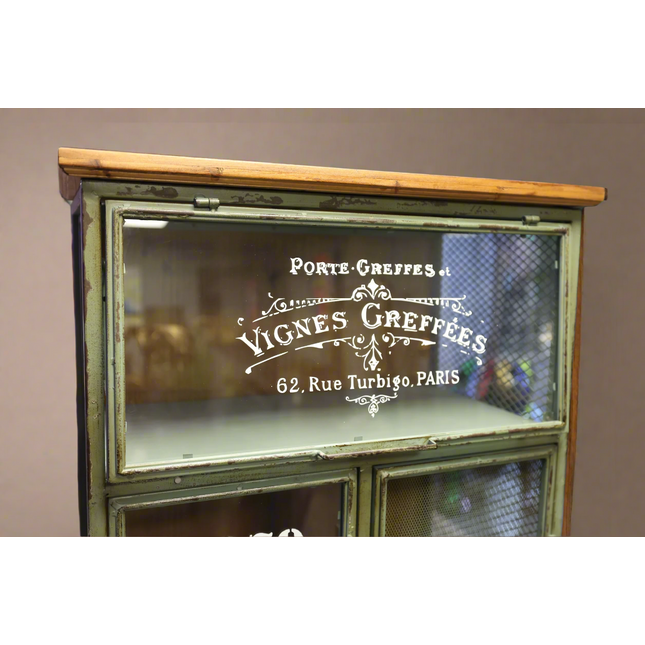Tall green metal multi drawer storage cabinet