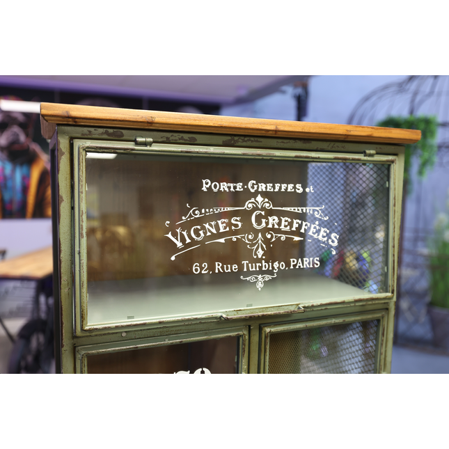 Tall green metal multi drawer storage cabinet
