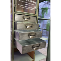 Tall green metal multi drawer storage display cabinet