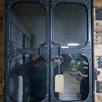 Black metal wall storage cabinet with double glass doors