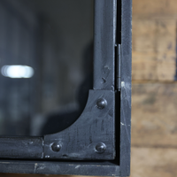 Black metal wall storage cabinet with double glass doors