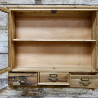 Glass fronted rustic wood wall cabinet