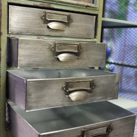 Tall green metal multi drawer storage display cabinet