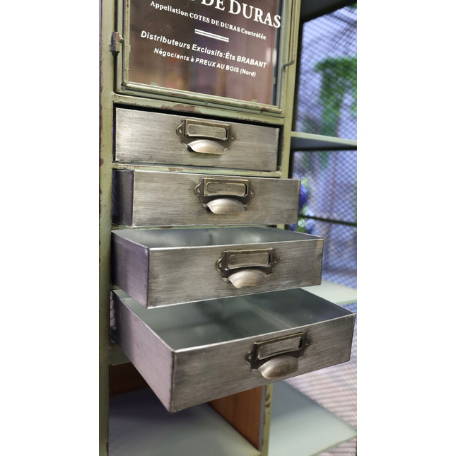 Tall green metal multi drawer storage display cabinet