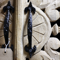 Tall Hand-Carved Natural Wood Storage Cabinet with Shelves