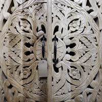 Tall Hand-Carved Natural Wood Storage Cabinet with Shelves