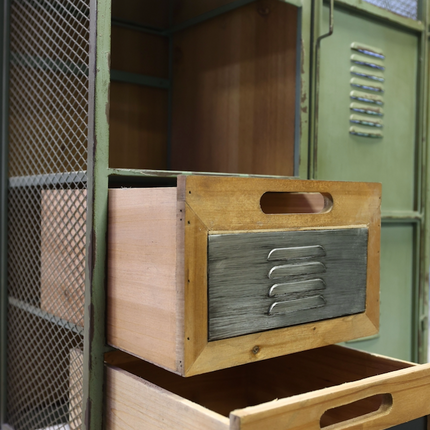 Vintage-style metal locker with wooden drawers on a tiled floor.