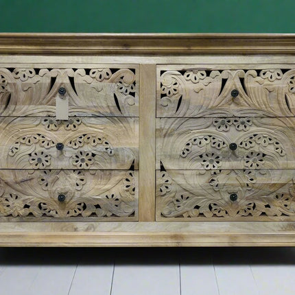 Large ornate carved natural wood chest of 6 drawers