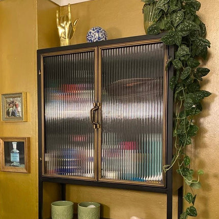 Black metal wall storage display cabinet with ribbed glass doors