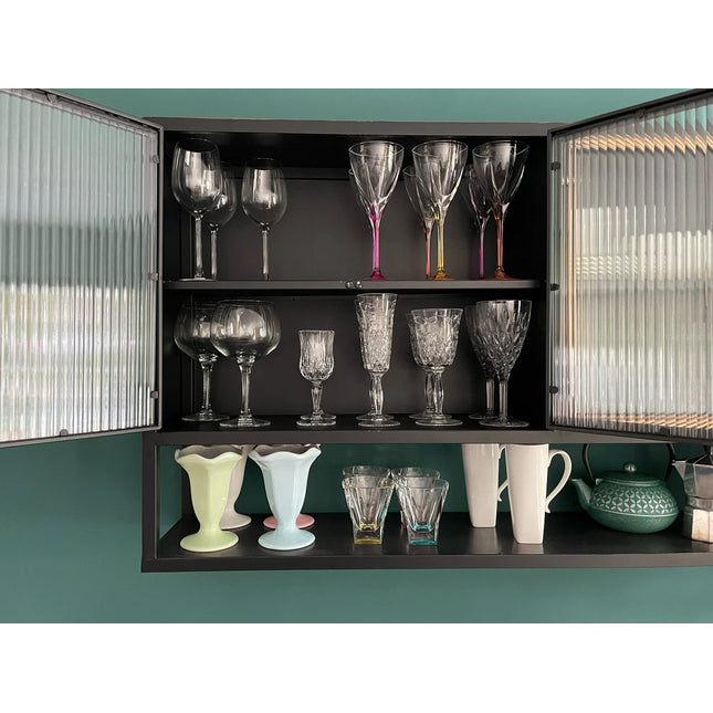 Black metal wide wall storage cabinet with ribbed glass double doors