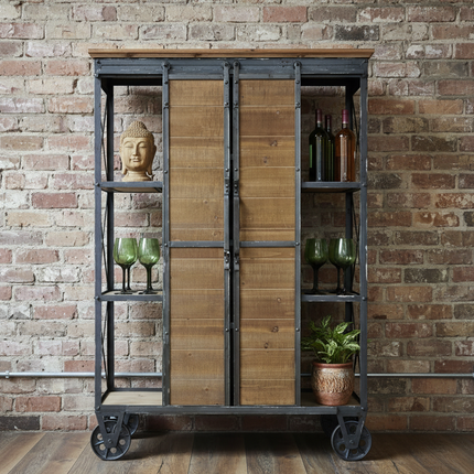 Rustic wood and metal storage cabinet with sliding  doors on industrial wheels UK - Elderflower Lane