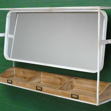 white metal wall mirror with shelf