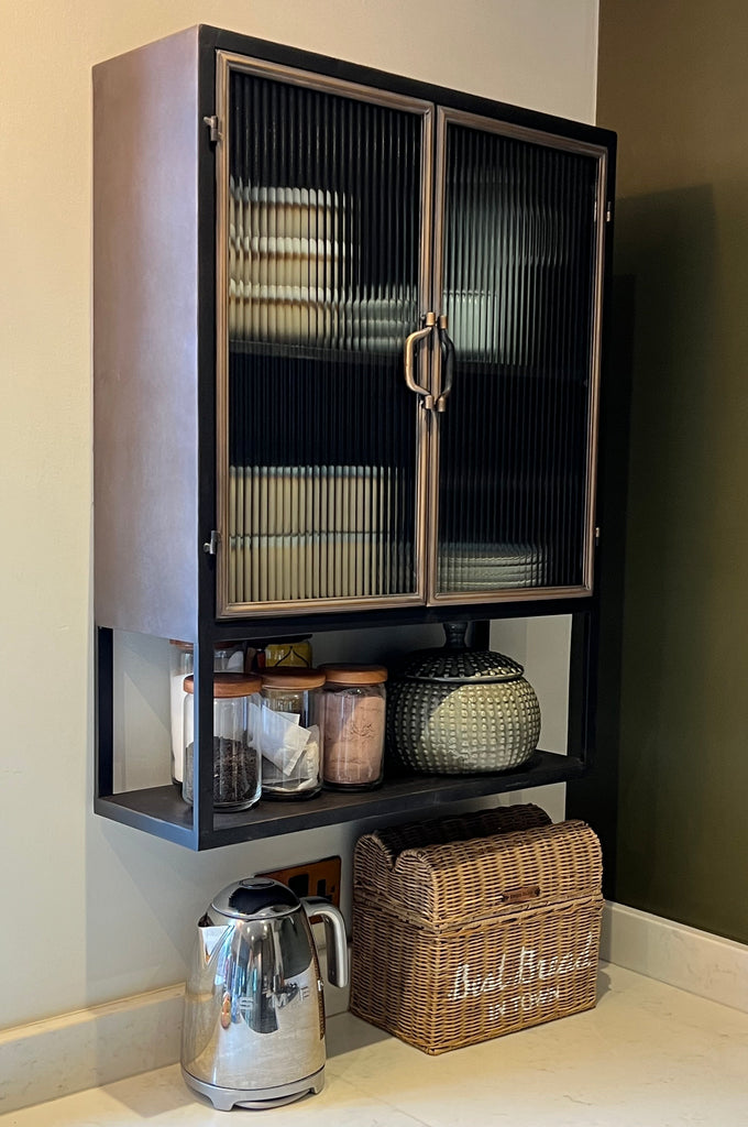 Black Industrial retro metal wall storage cabinet with double ribbed glass doors.