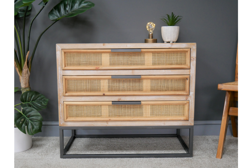 Wood & rattan chest of drawers.