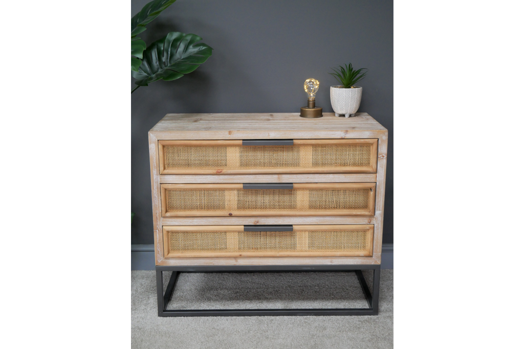 Boho natural wood & rattan chest of drawers.